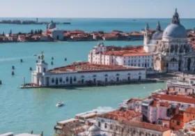 Venice, Italy, specifically featuring a view of the Grand Canal and the Santa Maria della Salute church. 
