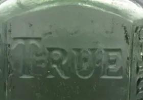 3 medical glass bottles, close up. 