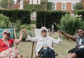 Three summer programme students enjoying an event
