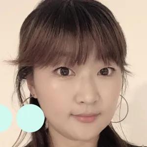 Selfie of Asian woman with hair half up half down