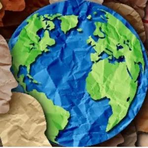 Origami globe with surrounding paper silhouettes of human faces, arranged in a circle.