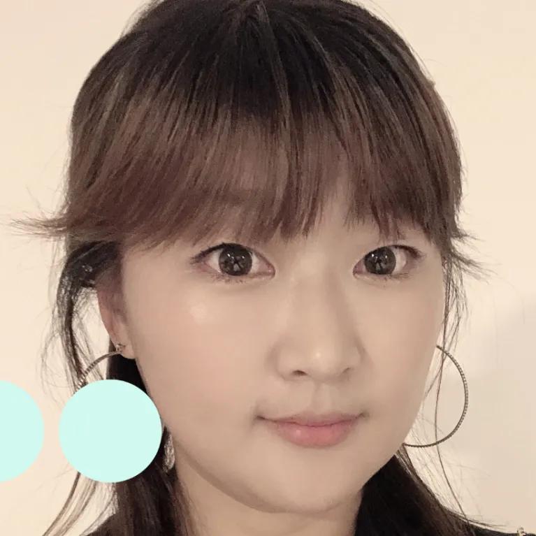 Selfie of Asian woman with hair half up half down