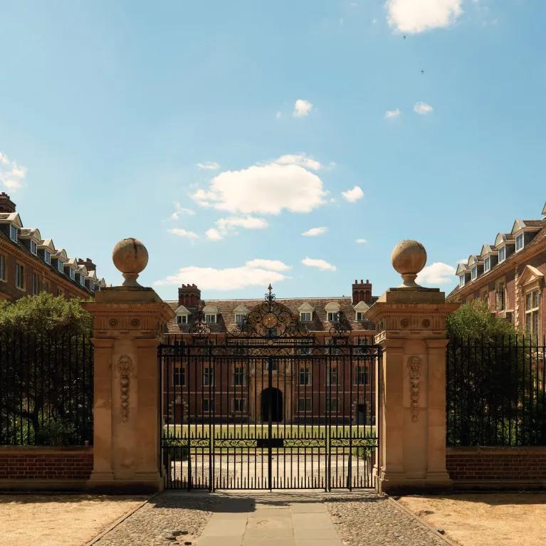 The exterior of St Catherine's College shown through the gates.