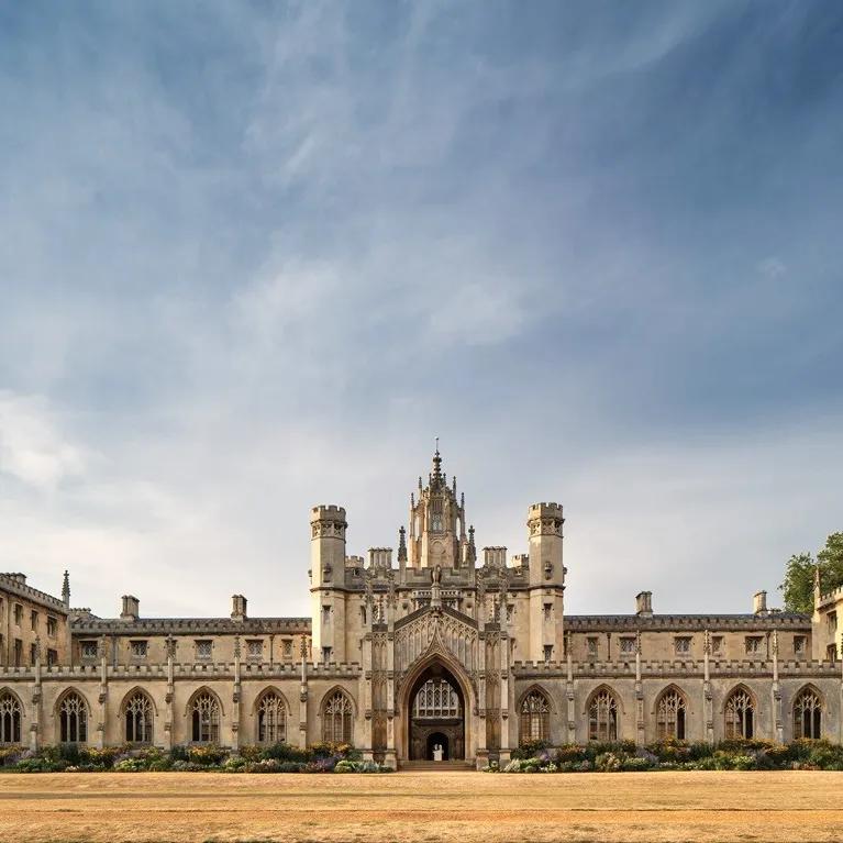 The exterior of St John's College against a blue sky. 