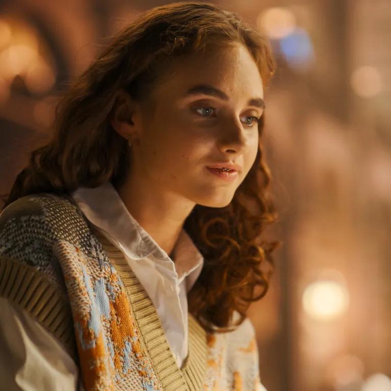 Lady in an old candlelit building