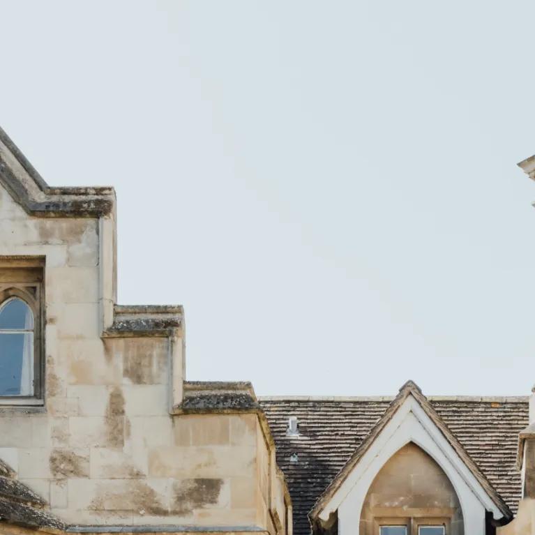 Architecture of Cambridge with blue sky behind