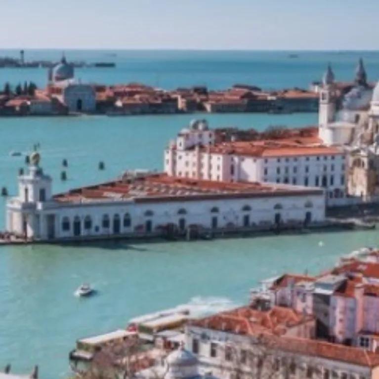 Venice, Italy, specifically featuring a view of the Grand Canal and the Santa Maria della Salute church. 