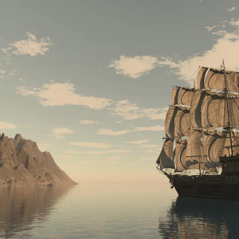 A large, multi-masted pirate ship with full sails floats on calm water near a rocky island under a cloudy sky.
