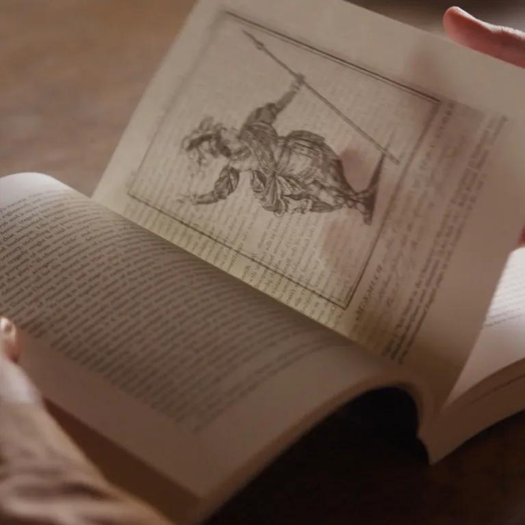 Scrolling through art history book